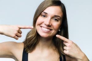 beautiful-young-woman-with-perfect-smile-isolated-on-white